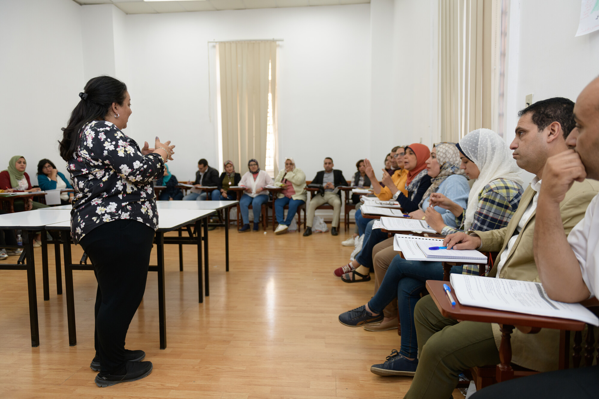 instructor in class explaining information