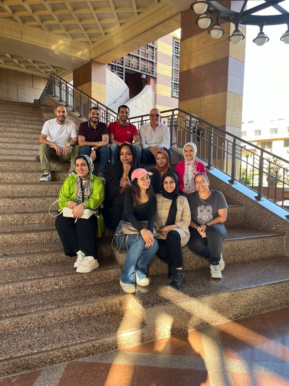 smiling students on campus in tahrir