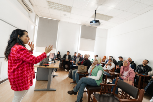 instructor explaining to students information in class