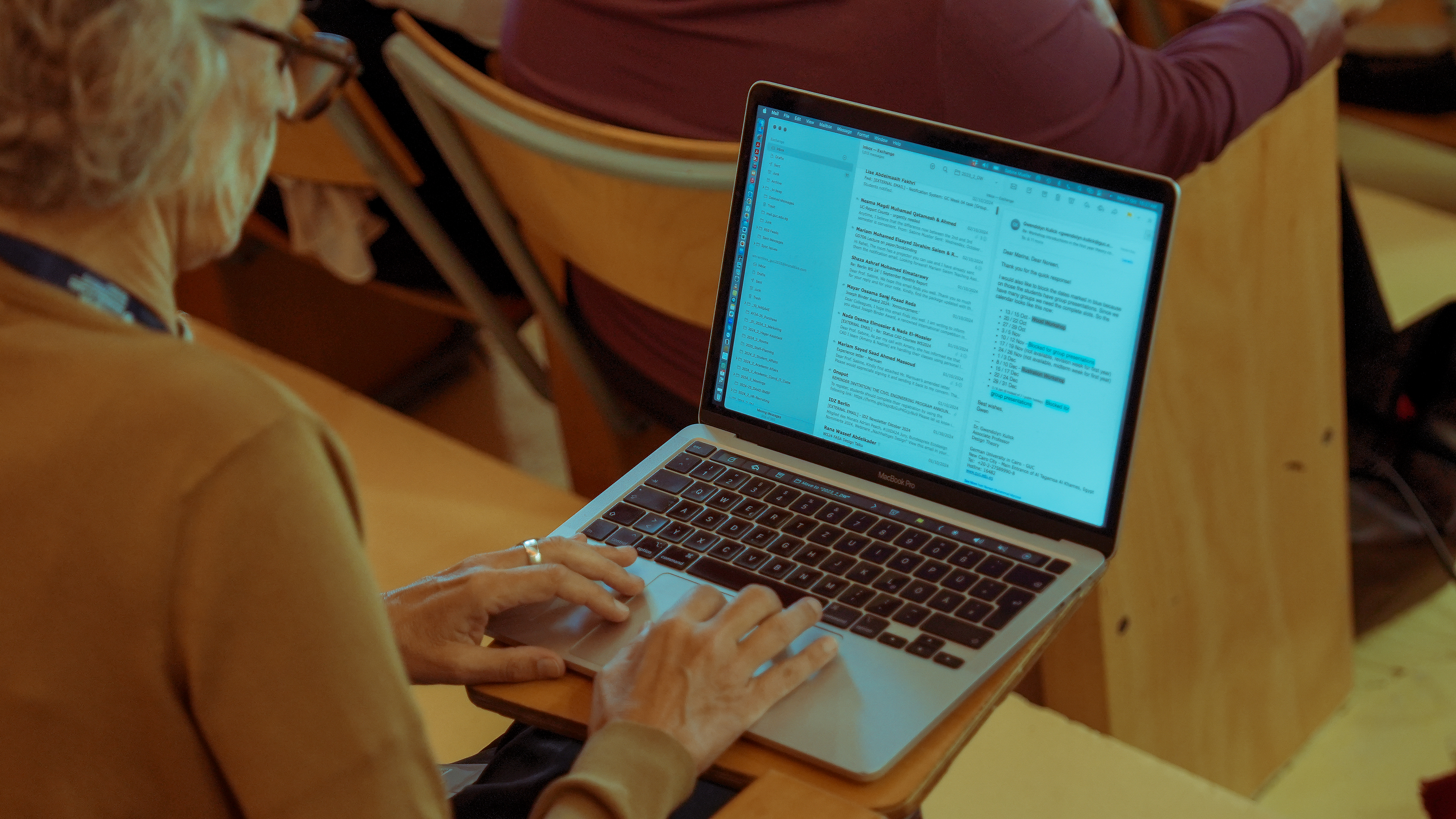 A woman studying on her laptop