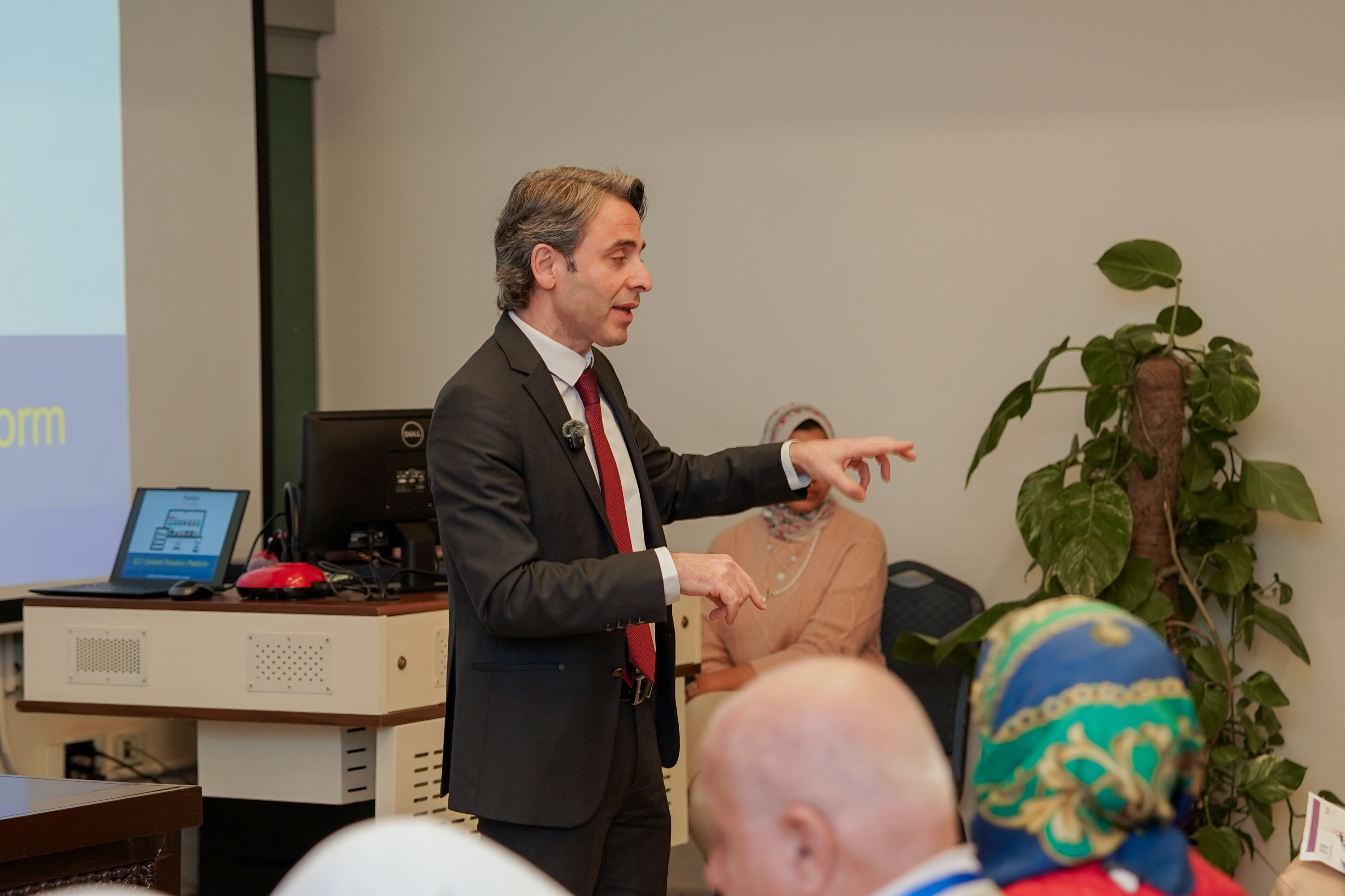 instructor explaining to students in a class