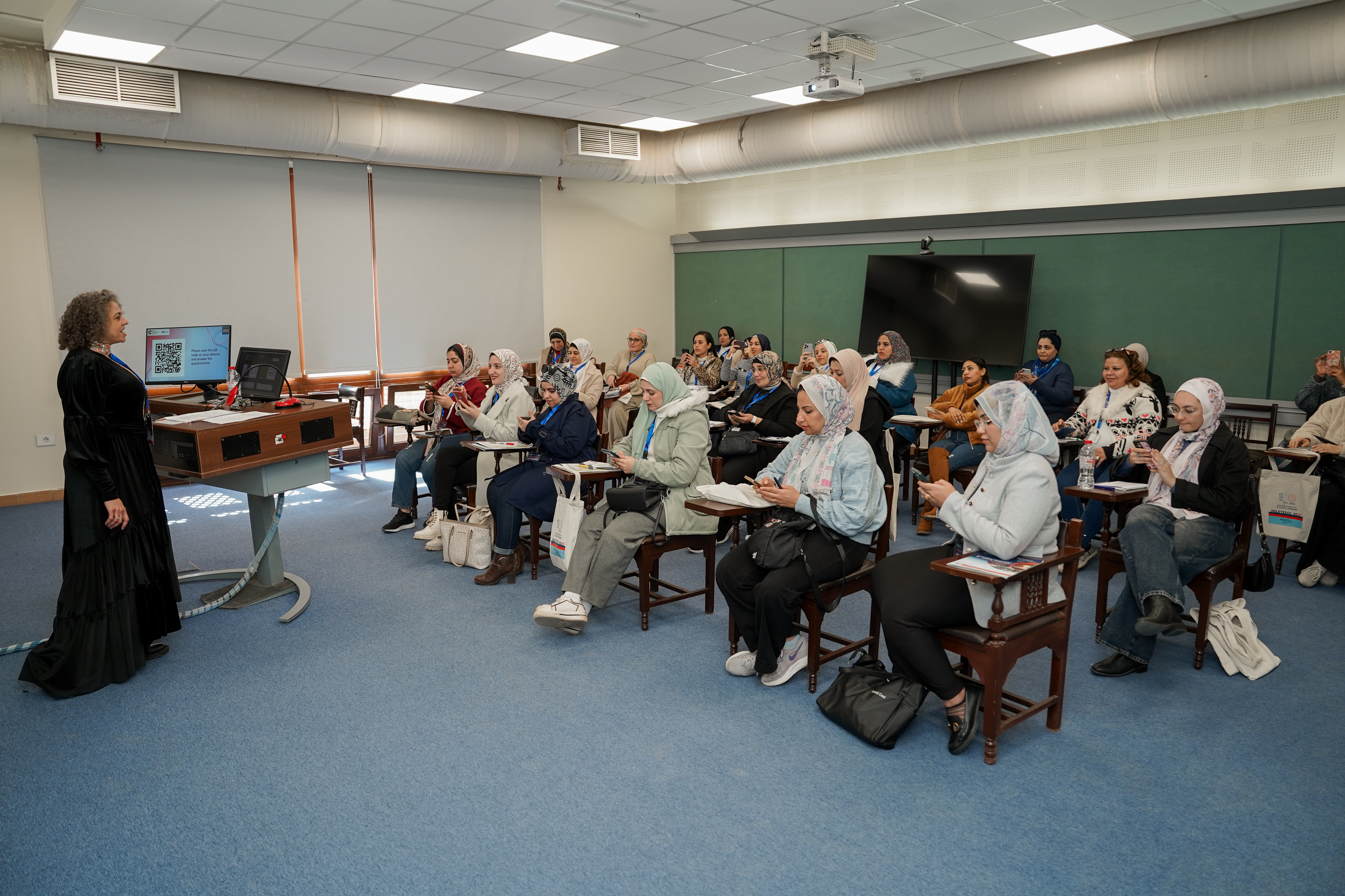instructor explaining to students in a class