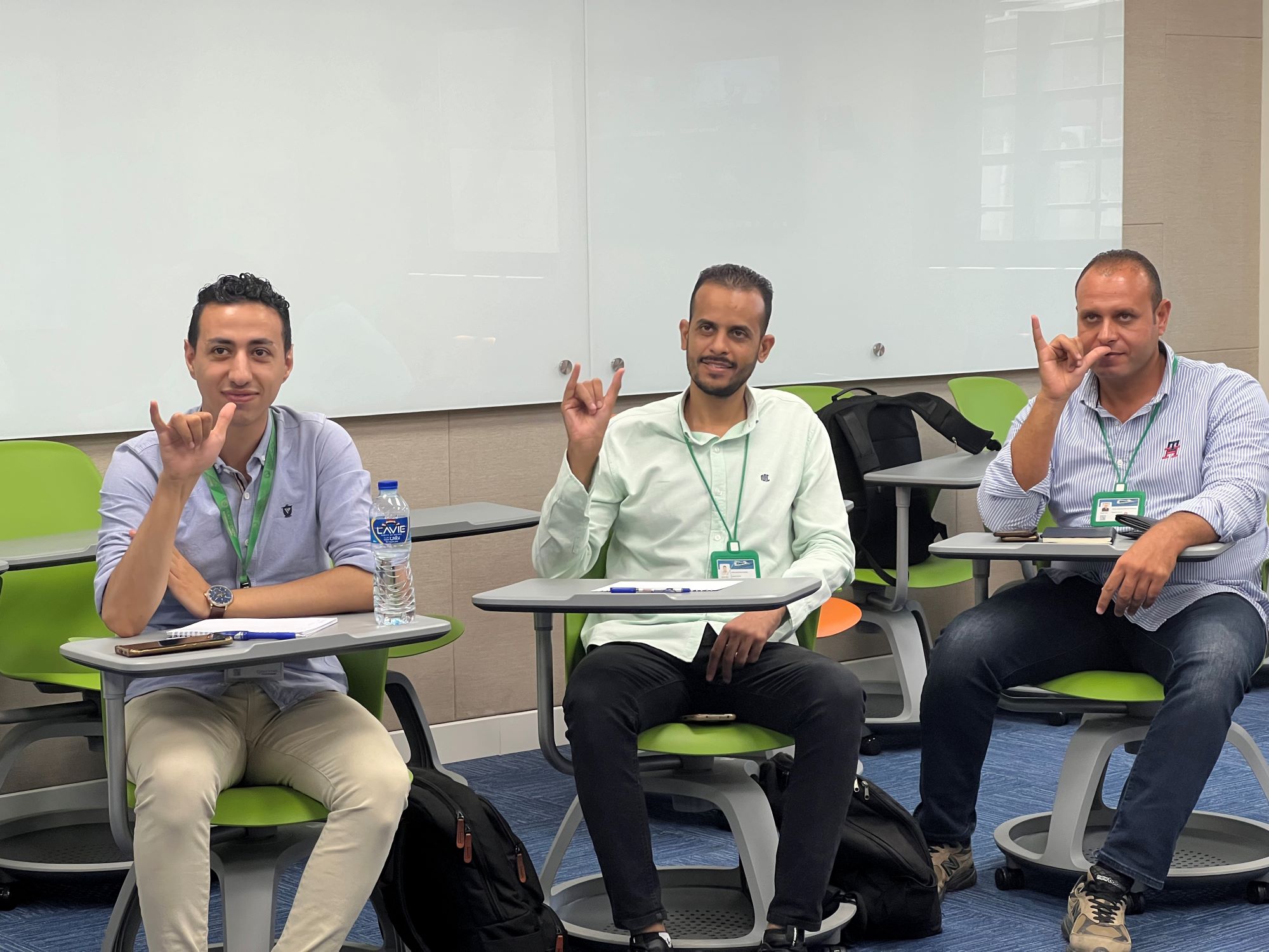 students learning the sign language in class