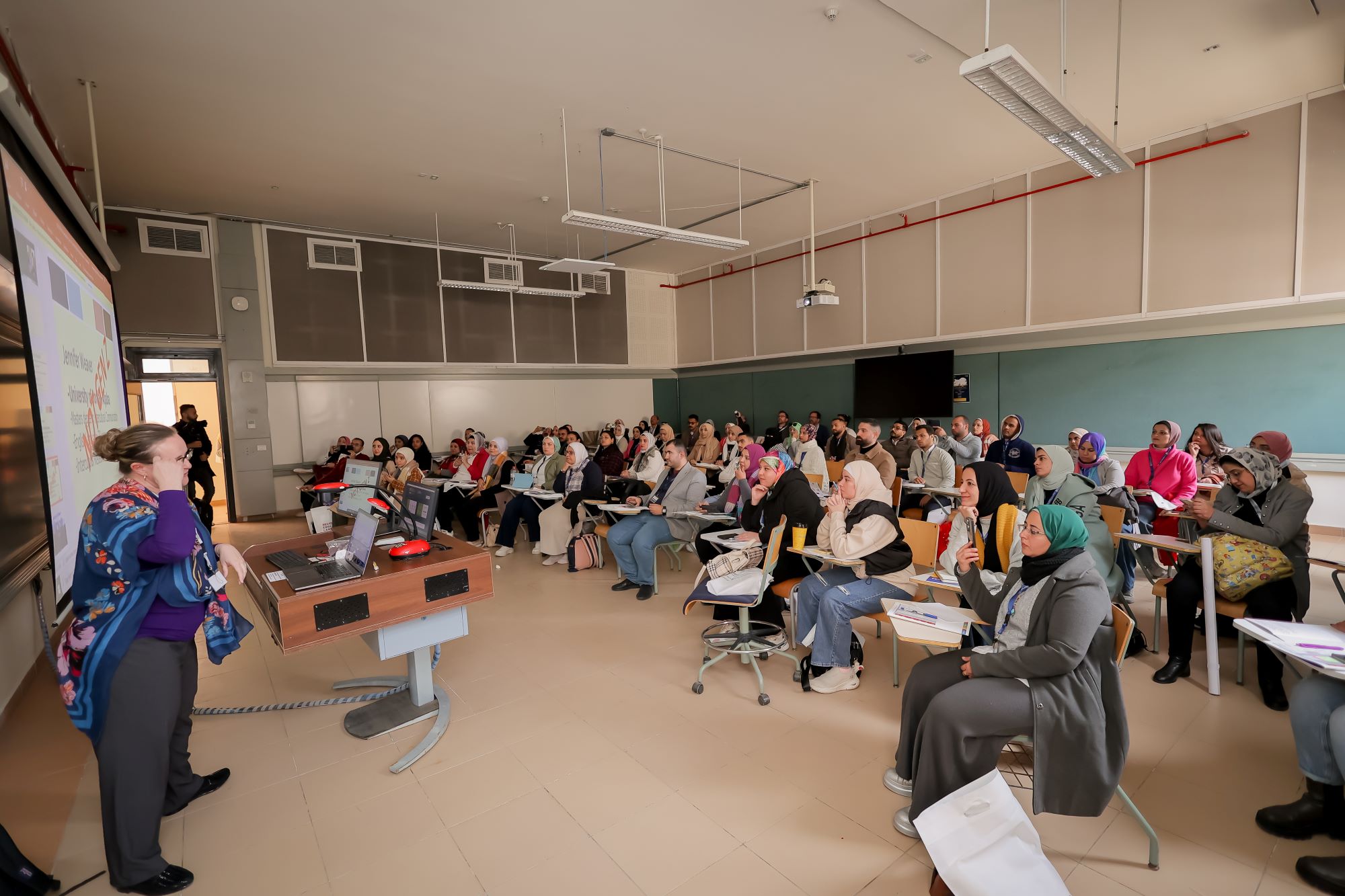 instructor explaining to students in a class