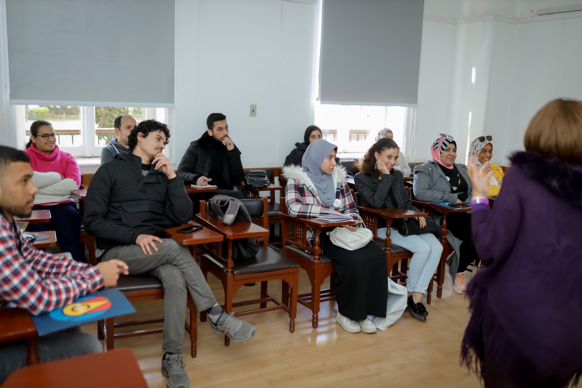 instructor explaining to students in a class the digital marketing course at AUC's SCE 