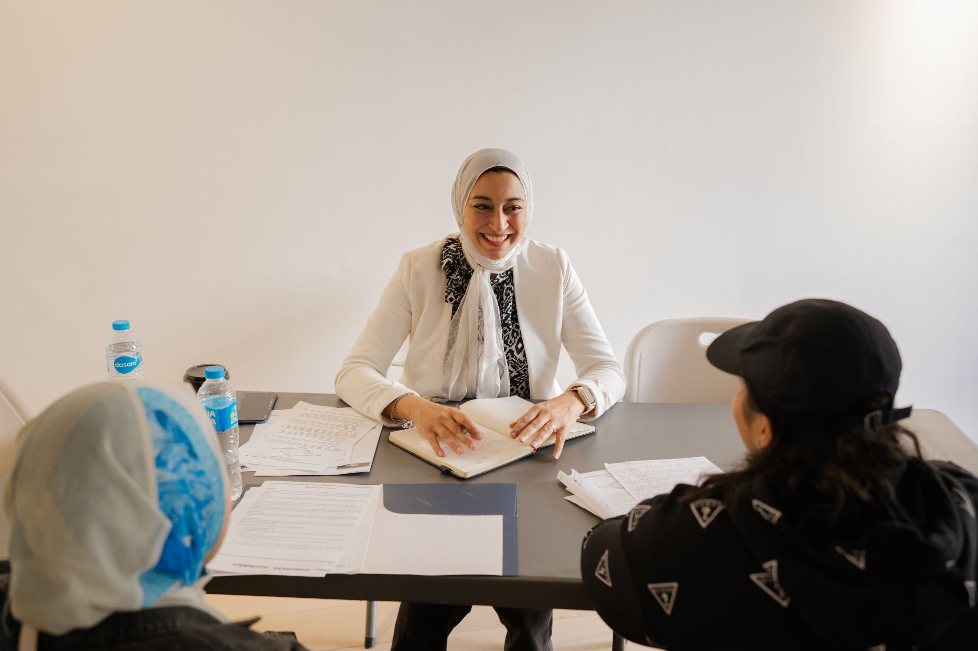 Instructor practicing Negotiation Skills with students in class 