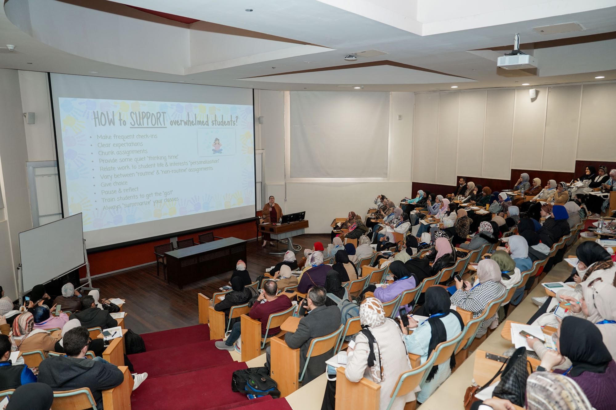 instructor explaining to students in a class about Supply Chain Excellence and Sustainability course at AUC's SCE