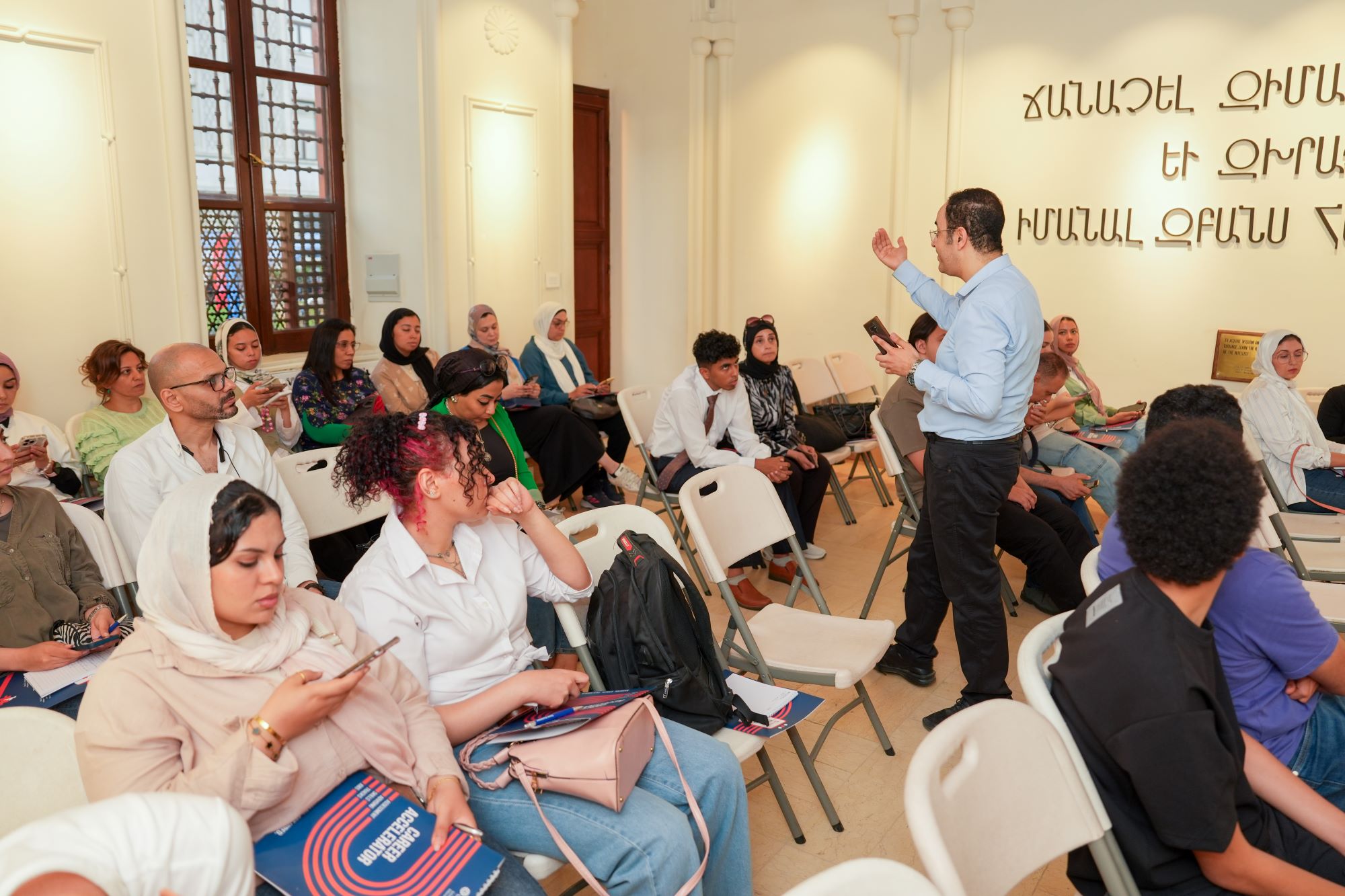 instructor explaining to students in a class