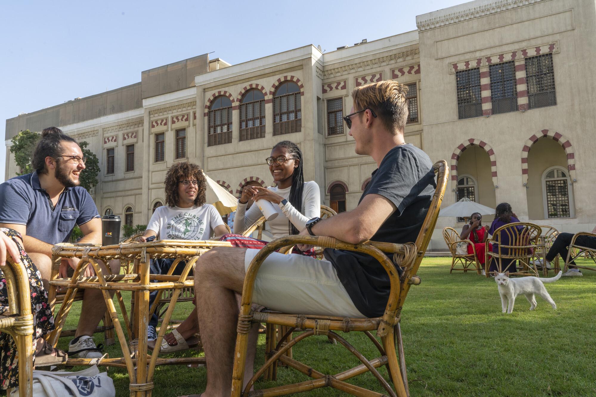 group of students talking at auc tahrir campus