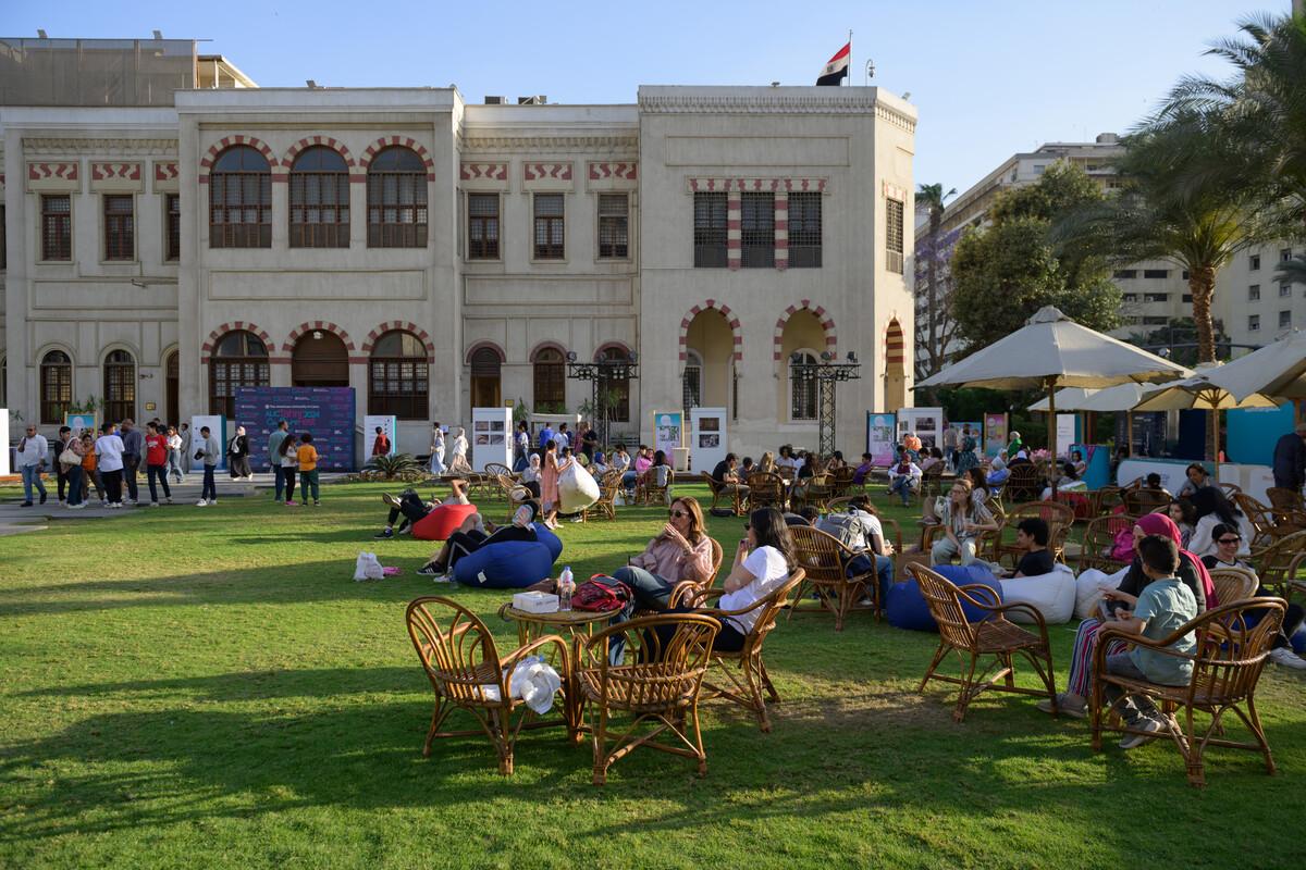 AUC tahiri campus image with garden with activity on campus