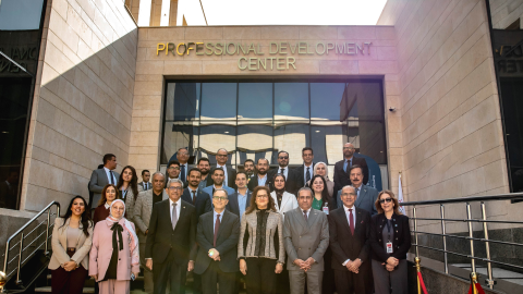 administrators standing in front of new professional development center