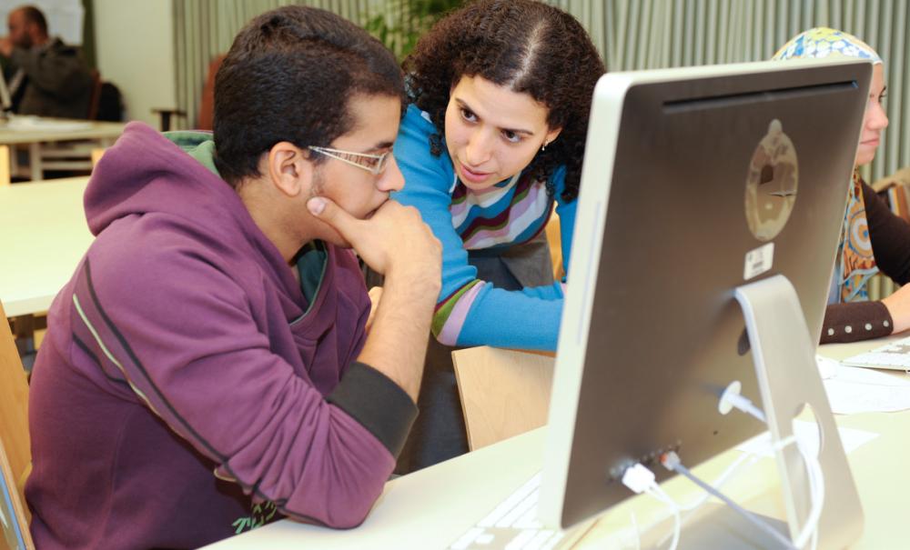 students working on project together in computer lab
