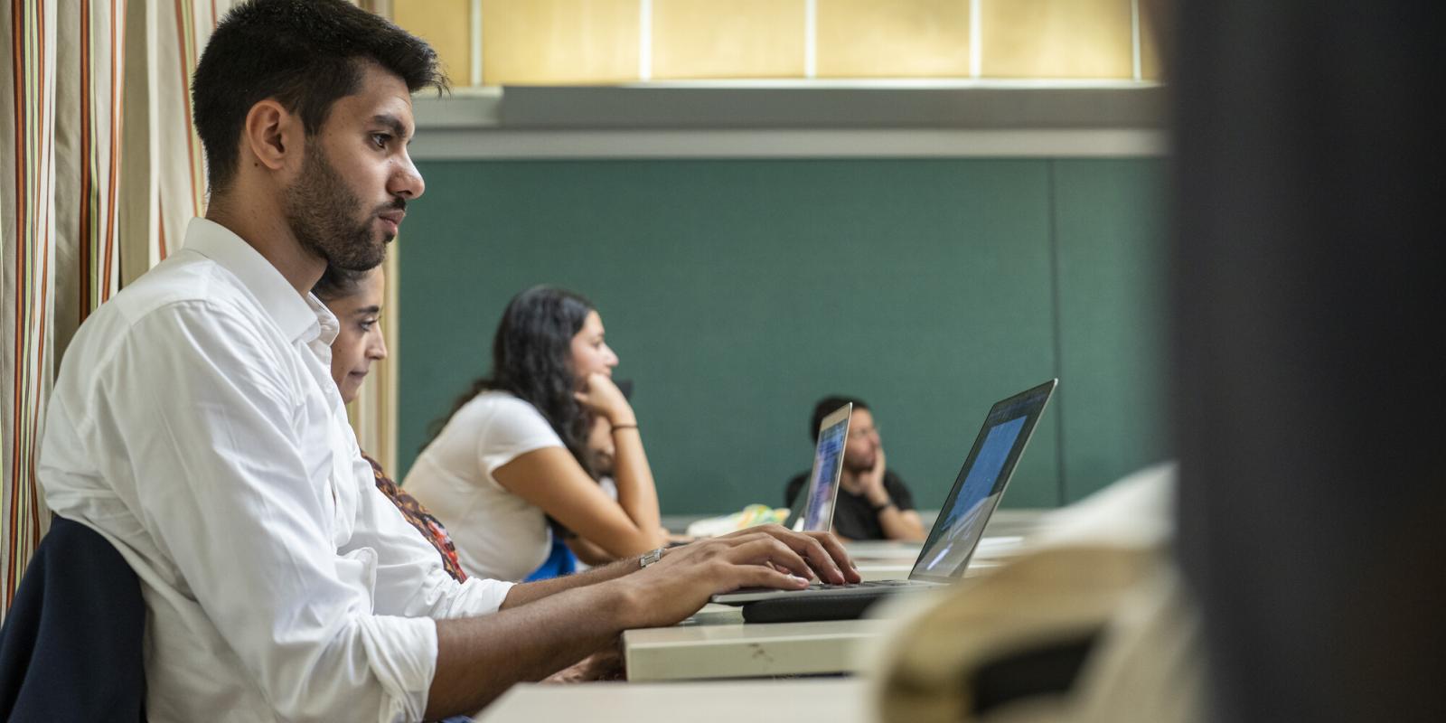 student working on laptop