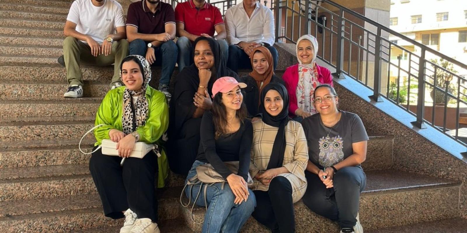 smiling students on campus in tahrir