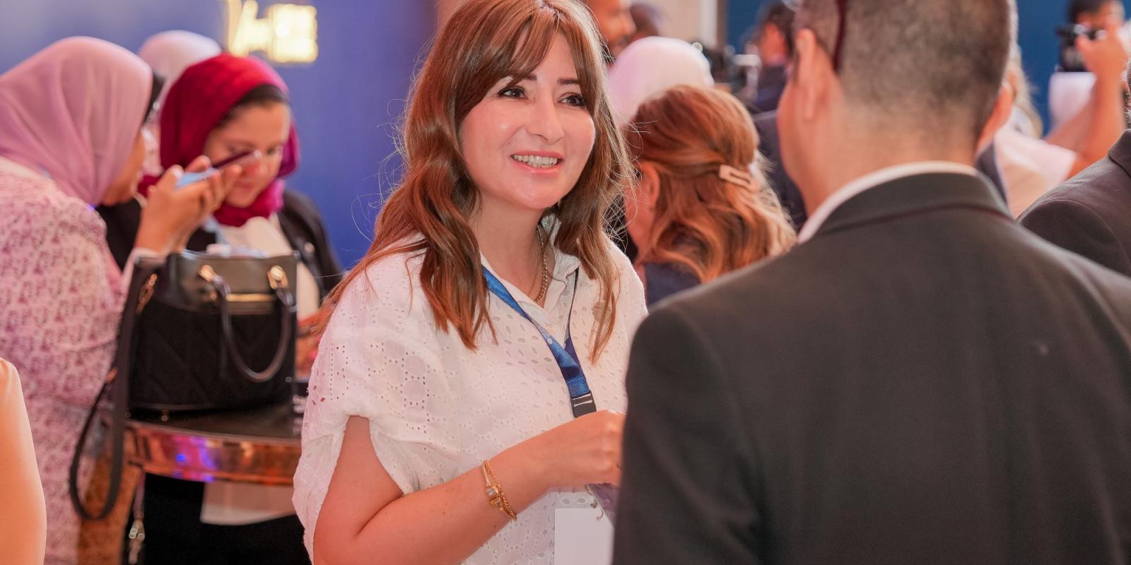 Two colleagues interacting in an event 