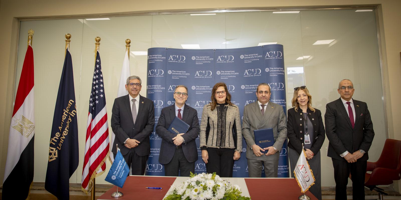 AUC President, Dr. Ahmed Dallal and AUC's SCE Dean, Dr. Mahmoud Allam signing the contract of collaboration between AUC' SCE and ACUD