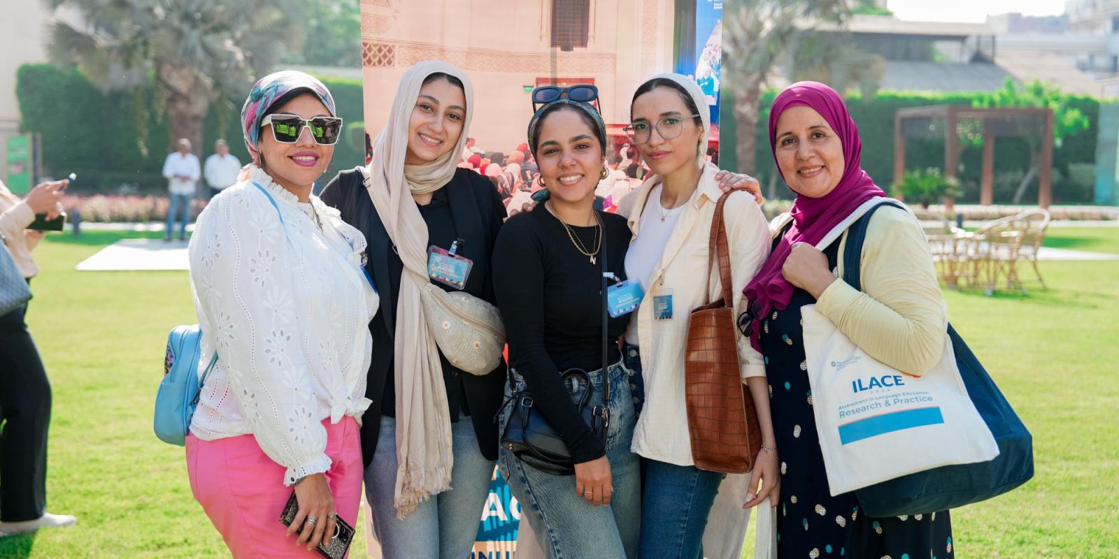 ILACE 2025 attendees in the registration area in the main Garden at Tahrir Square Campus
