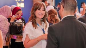 Two colleagues interacting in an event 