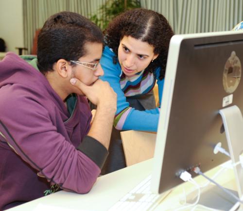 students working on project together in computer lab