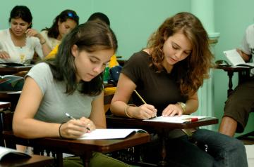 university students taking an exam
