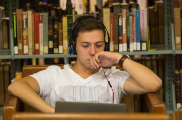 student in a library