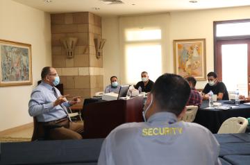 Security guards attend a class led by the School of Continuing Education
