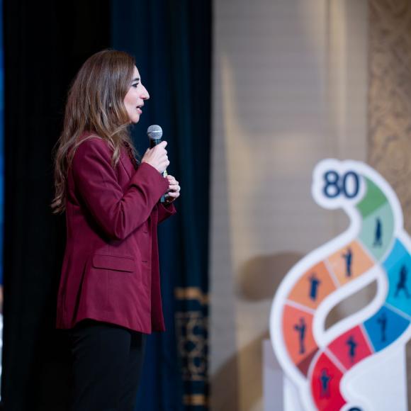 Dr. Doaa Salem introducing SCALE on Ewart Stage 