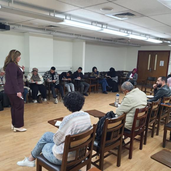 students in a class with their instructor in one of SCALE workshops